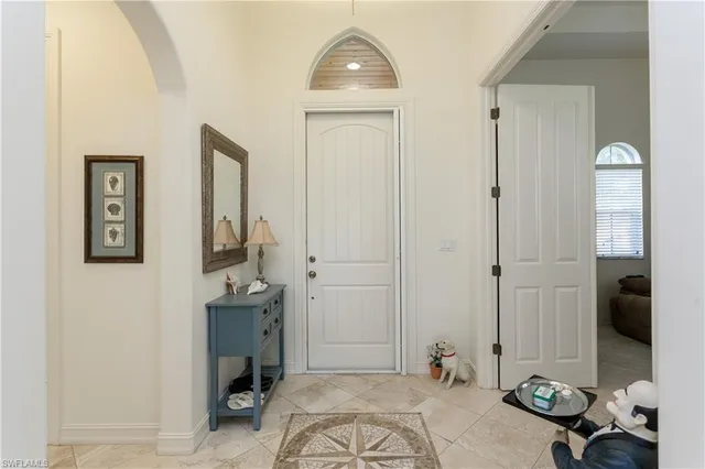 a view of a livingroom with shelves
