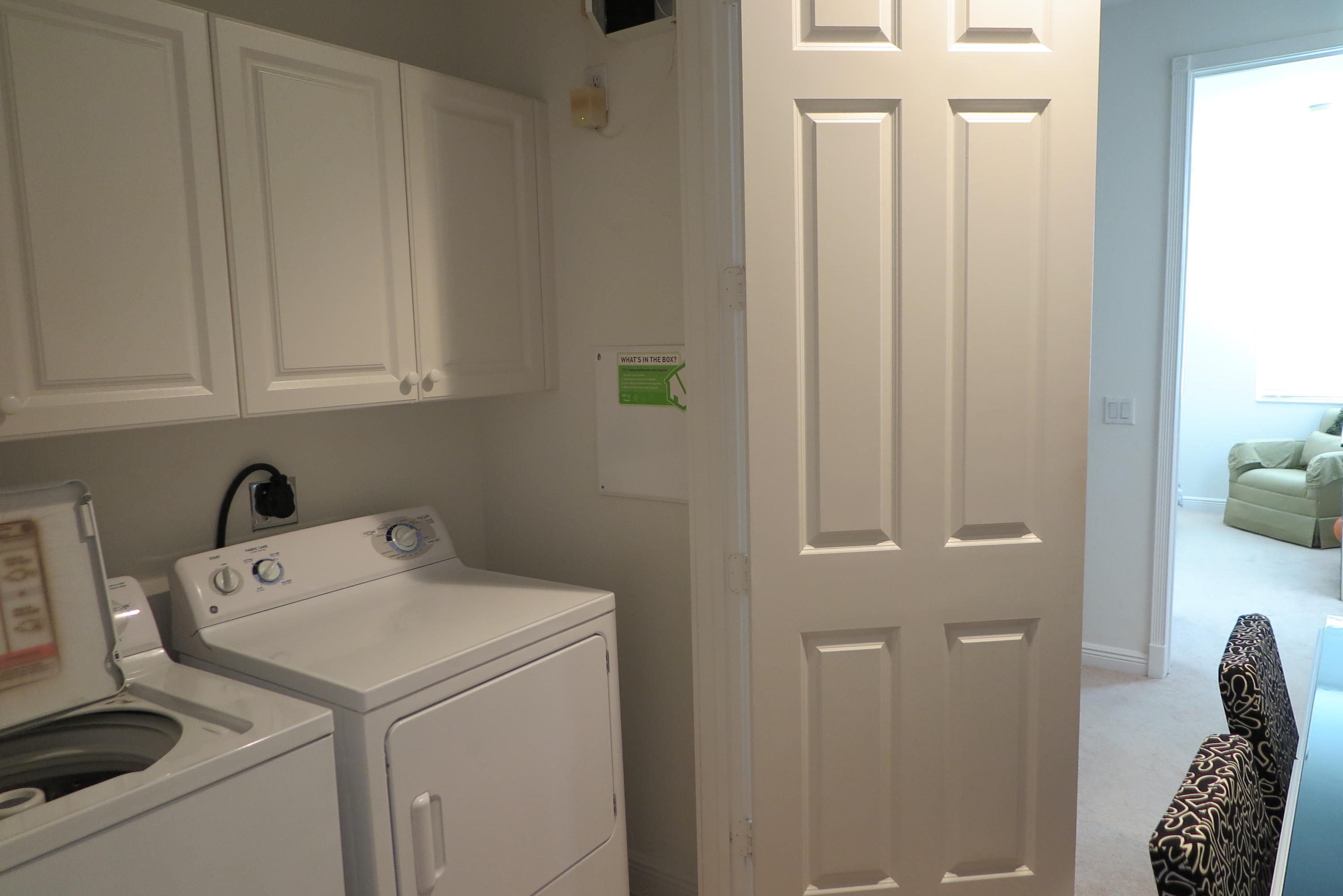 819 Northwest 82nd Place Boca Raton, FL 33487 - Photo 17 of 25 a utility room with dryer and washer