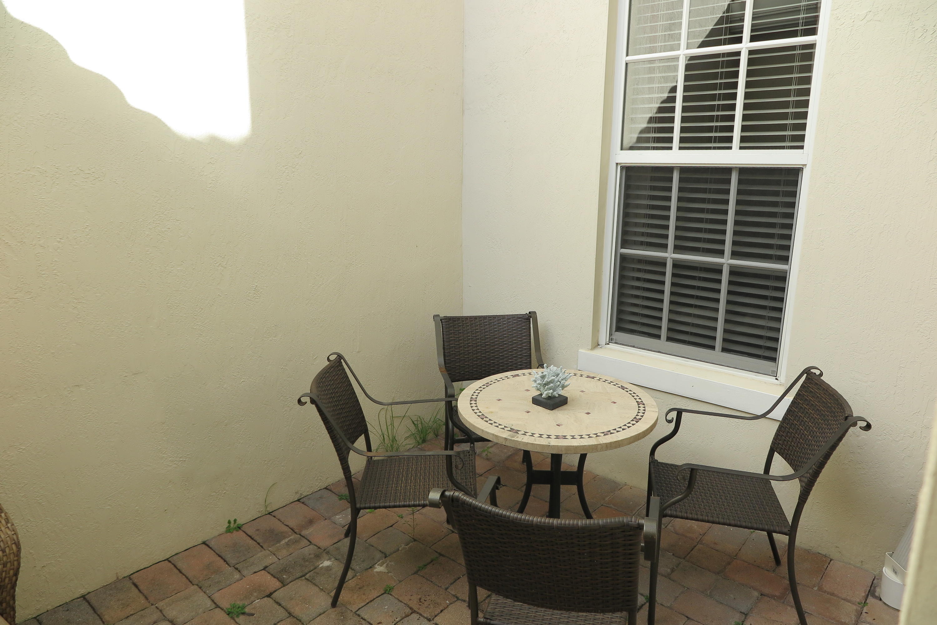 819 Northwest 82nd Place Boca Raton, FL 33487 - Photo 19 of 25 a view of a room with a table and chairs