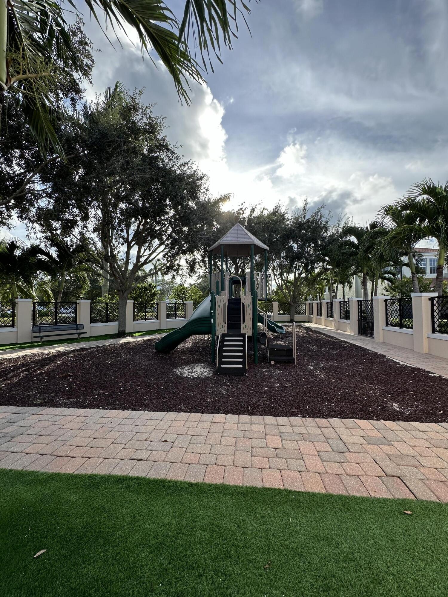 819 Northwest 82nd Place Boca Raton, FL 33487 - Photo 22 of 25 a view of outdoor space with garden