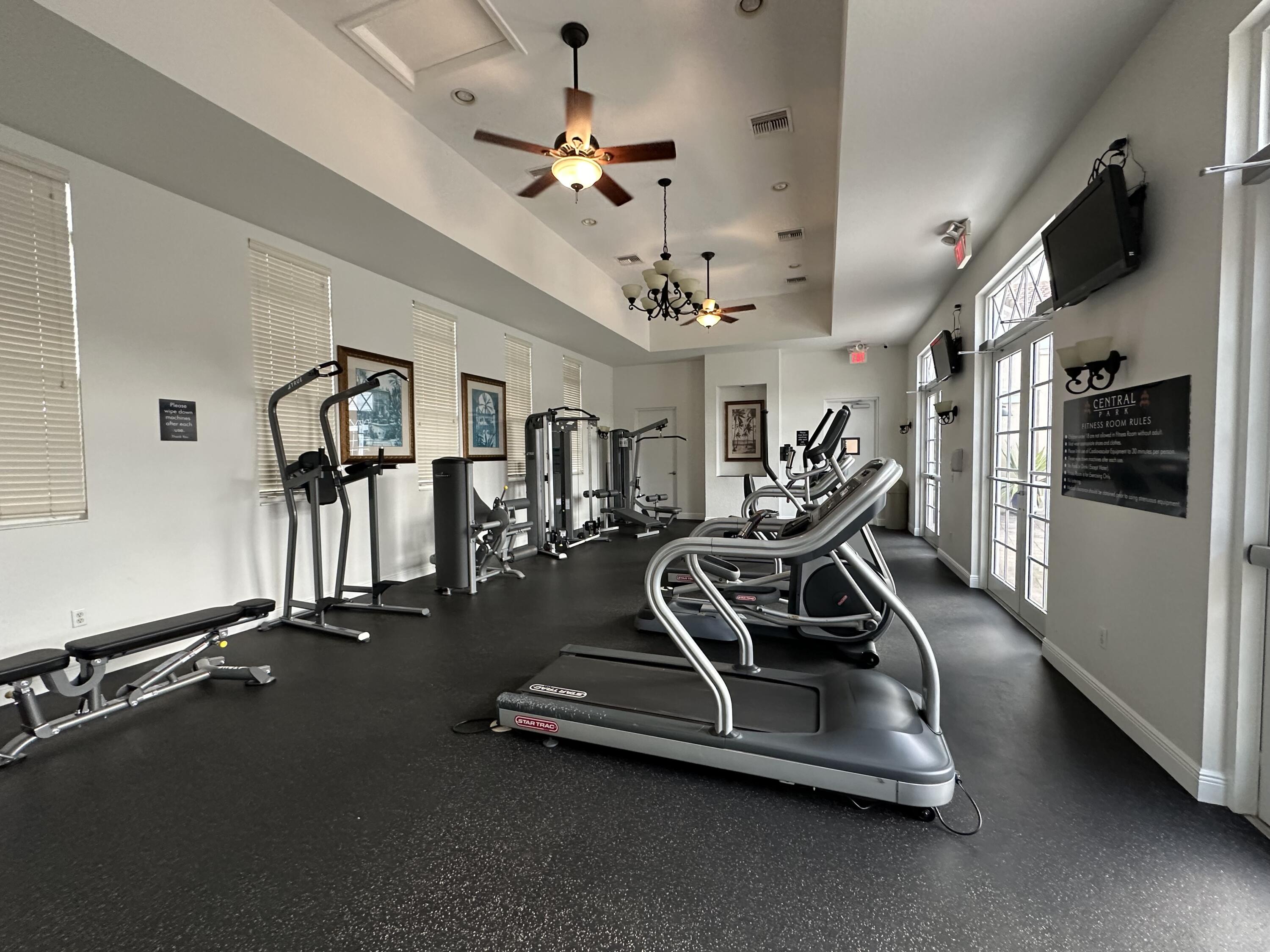 819 Northwest 82nd Place Boca Raton, FL 33487 - Photo 23 of 25 a view of a room with gym equipment