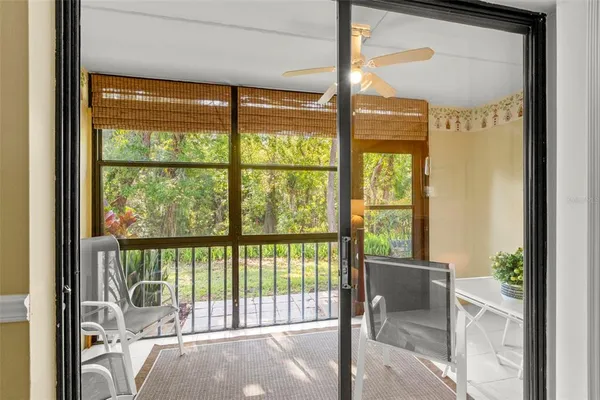 a view of a porch with a furniture