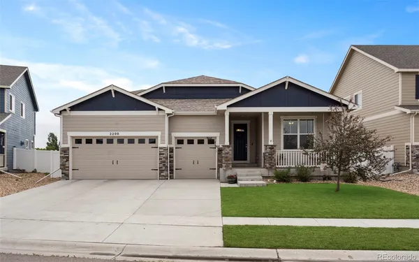 a view of a house with a garden