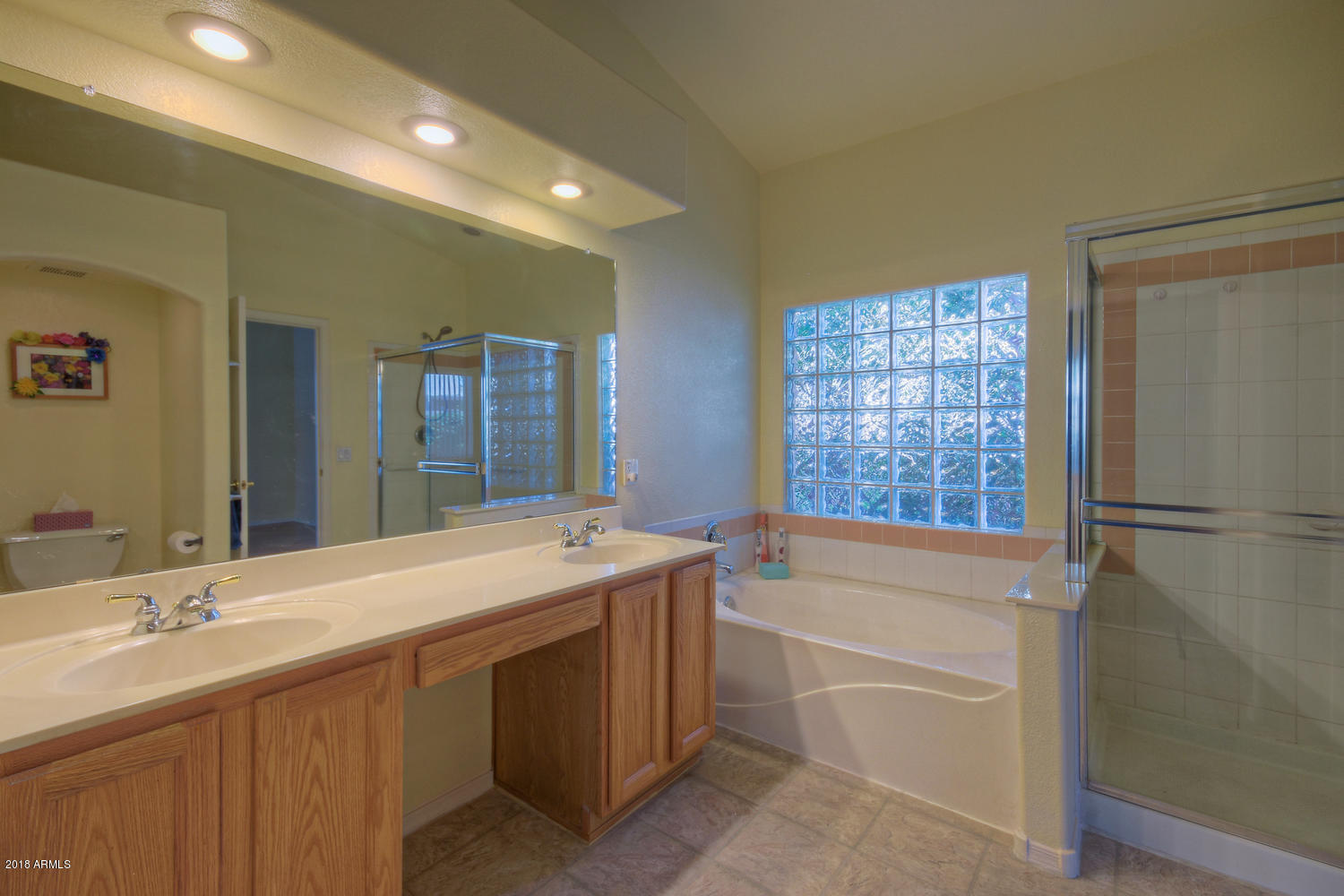 124 West Grandview Road Phoenix, AZ 85023 - Photo 14 of 21 a bathroom with a tub sink and mirror
