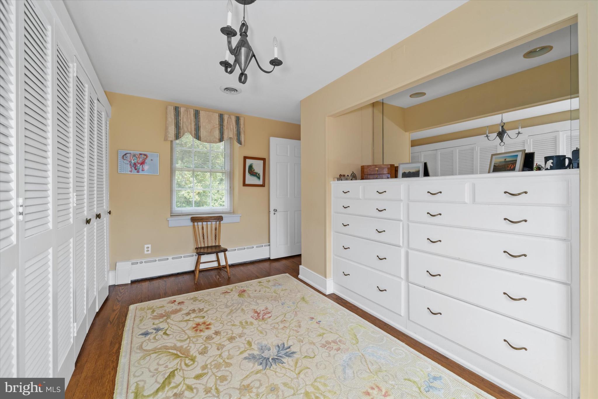 818 Burrows Run Road Chadds Ford, PA 19317 - Photo 23 of 90 a bedroom with a bed and a window