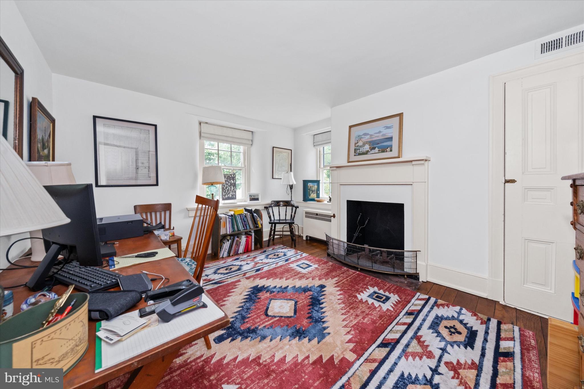 818 Burrows Run Road Chadds Ford, PA 19317 - Photo 32 of 90 a room with furniture a rug and a window