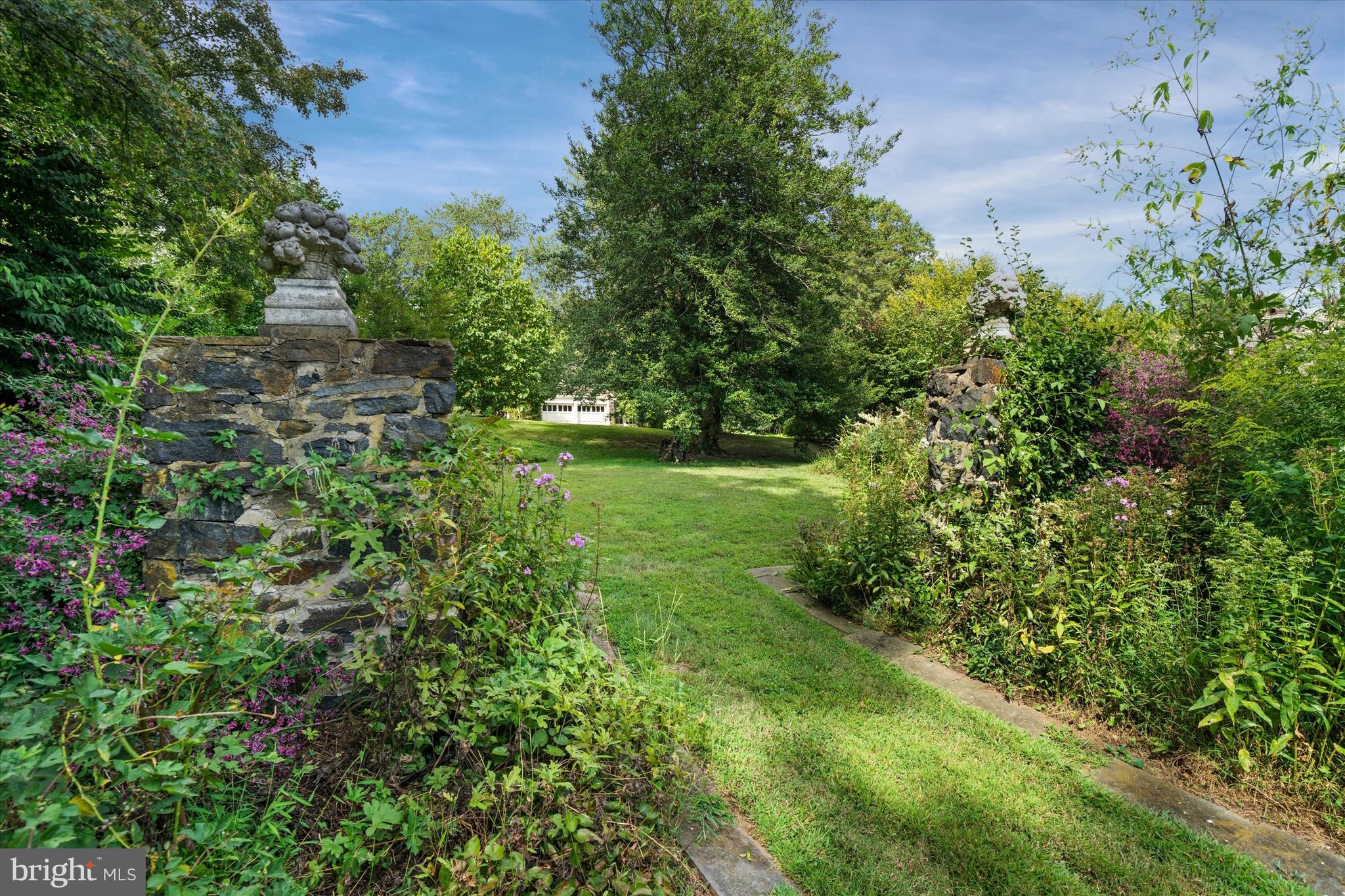 818 Burrows Run Road Chadds Ford, PA 19317 - Photo 47 of 90 a view of a garden with a building