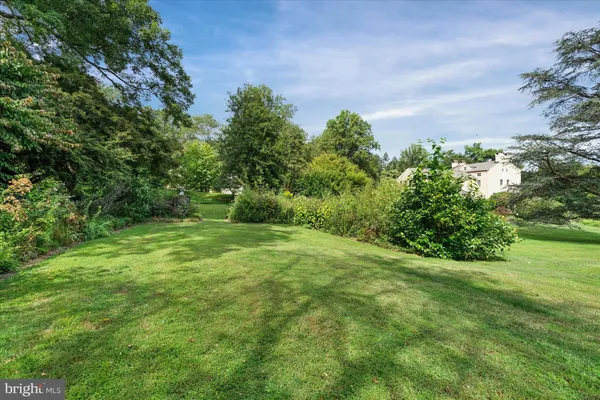 a view of a golf course with a yard