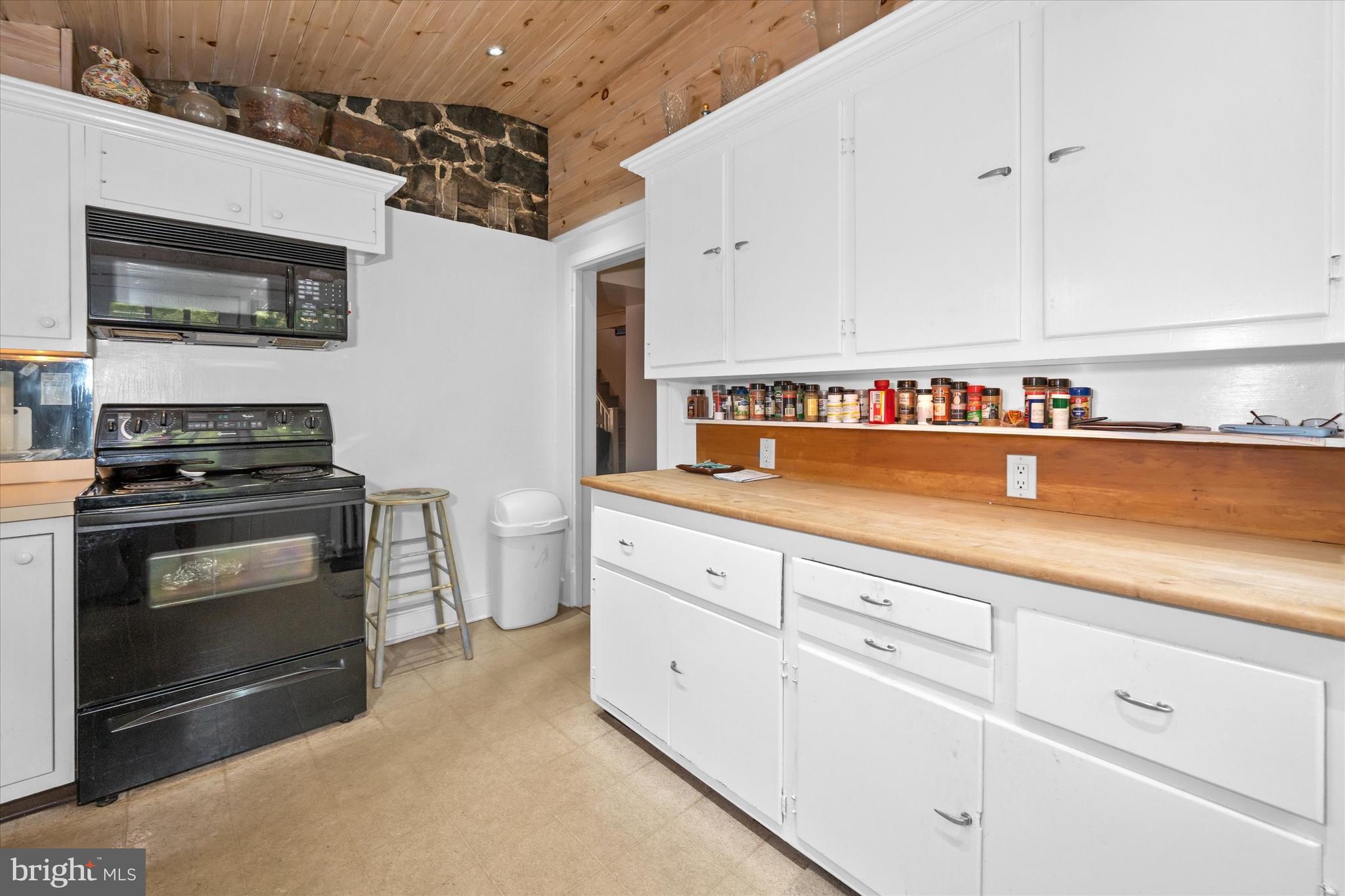 818 Burrows Run Road Chadds Ford, PA 19317 - Photo 60 of 92 a kitchen with stainless steel appliances granite countertop a stove and a sink