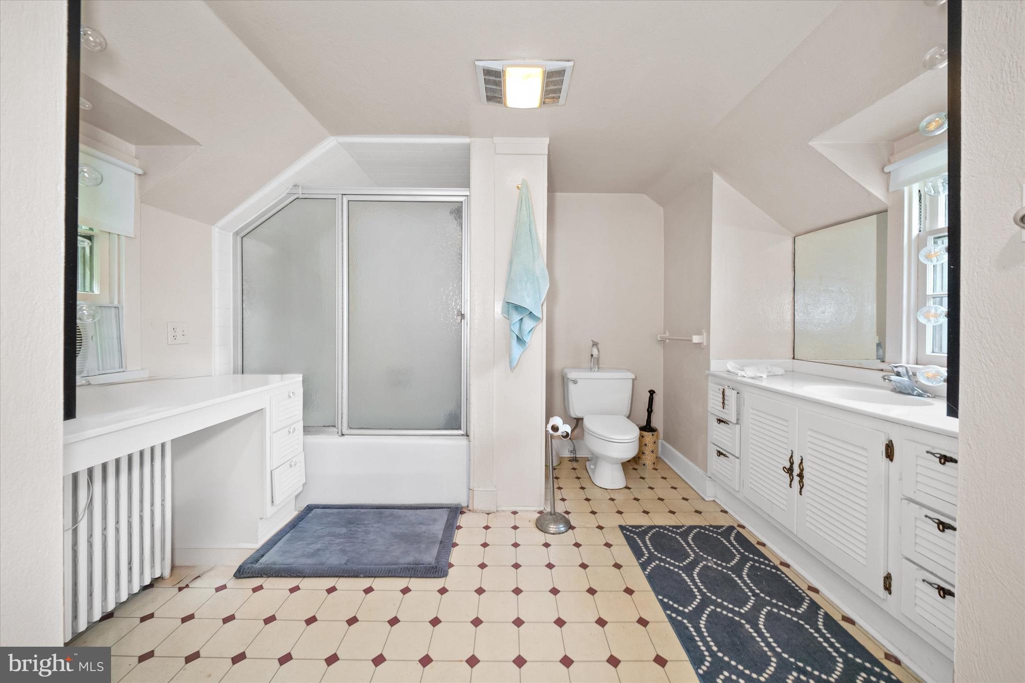 818 Burrows Run Road Chadds Ford, PA 19317 - Photo 65 of 90 a bathroom with a bathtub and a shower