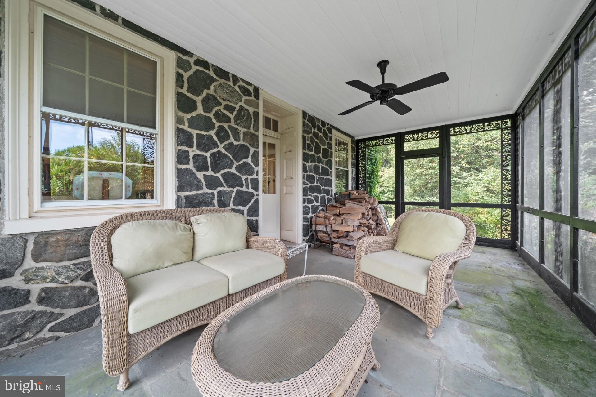 818 Burrows Run Road Chadds Ford, PA 19317 - Photo 9 of 90 a living room with furniture and a large window