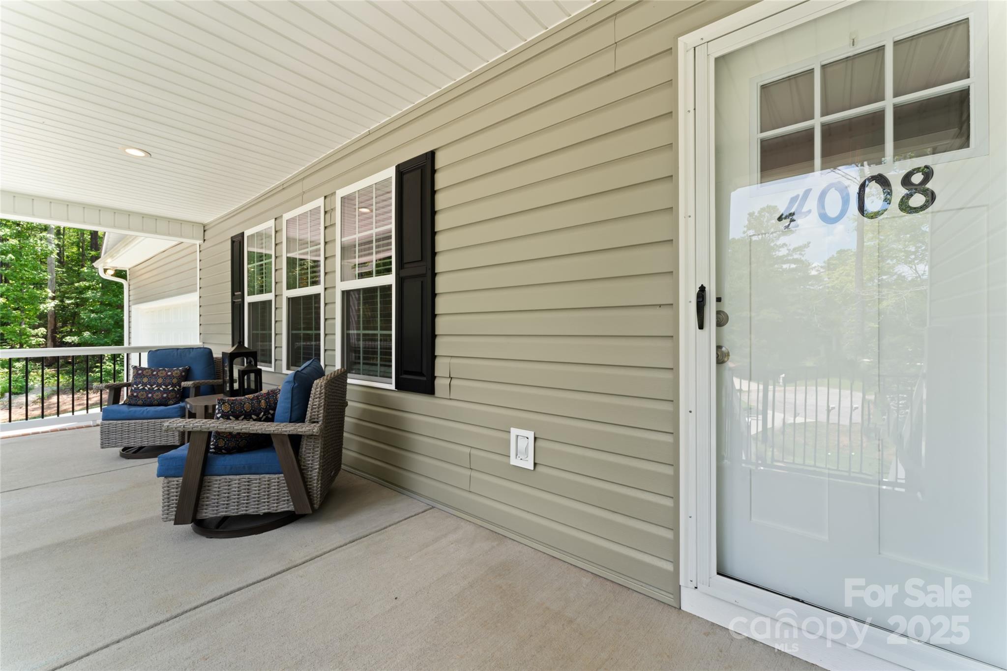 4008 Cypress Circle Lancaster, SC 29720 - Photo 4 of 33 a view of a patio with couches chairs and potted plants