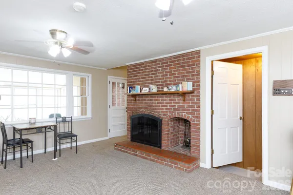 a view of a livingroom with a fireplace