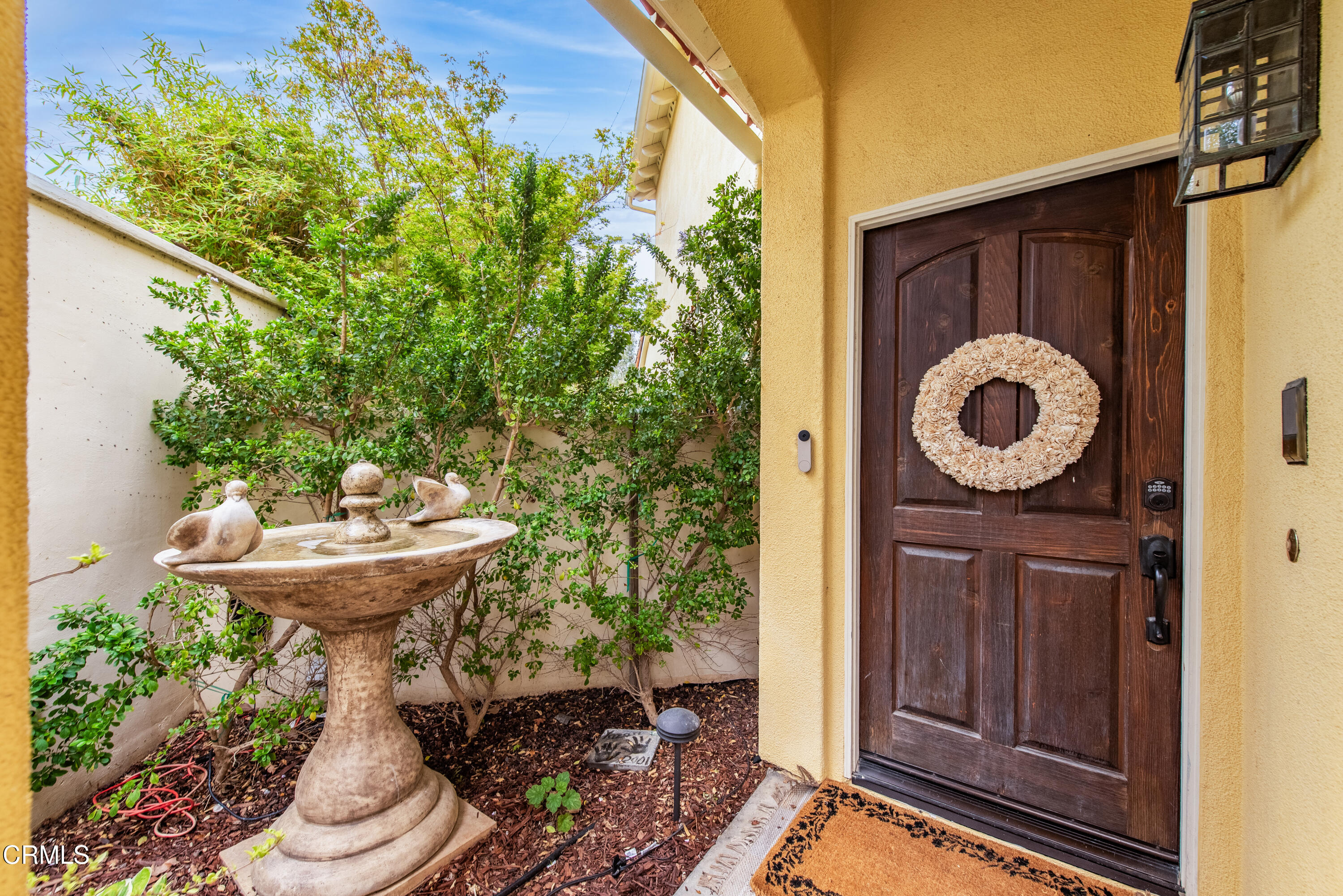 1143 Corte Riviera Camarillo, CA 93010 - Photo 3 of 39 a view of a balcony with chair and a potted plant