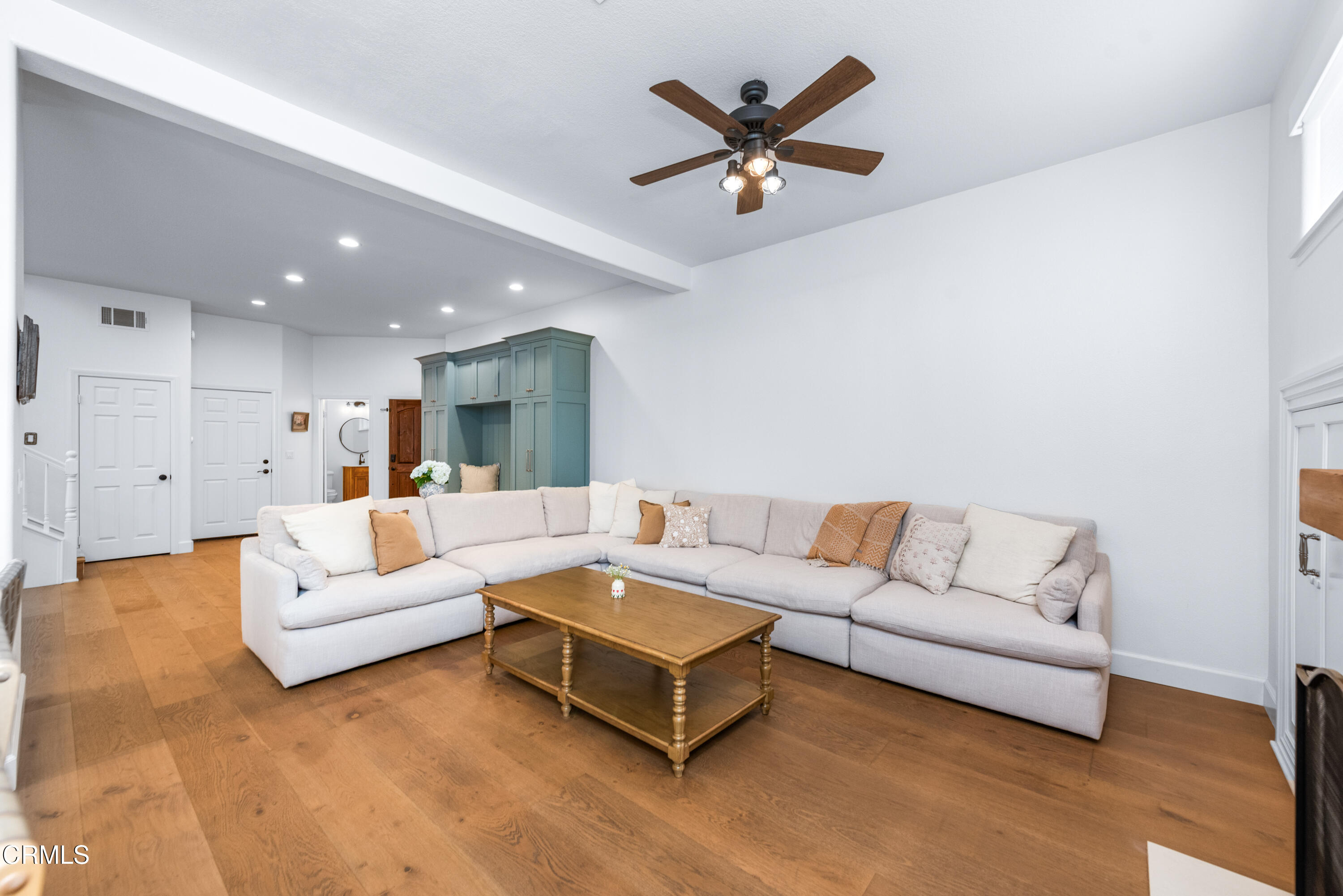 1143 Corte Riviera Camarillo, CA 93010 - Photo 10 of 39 a living room with furniture and a chandelier