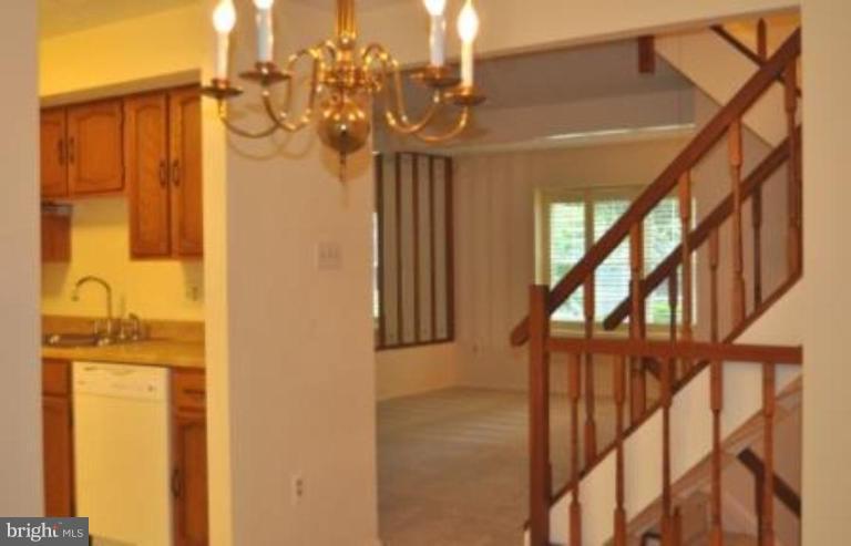 11510 Underoak Court Reston, VA 20191 - Photo 11 of 30 View from dining room to kitchen and living room.