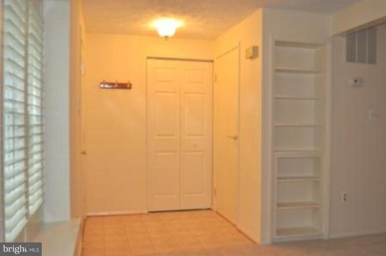 11510 Underoak Court Reston, VA 20191 - Photo 12 of 30 Big entry closet, powder room to right.