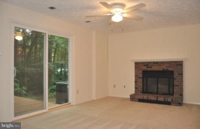 11510 Underoak Court Reston, VA 20191 - Photo 14 of 30 Wood-burning fireplace.
