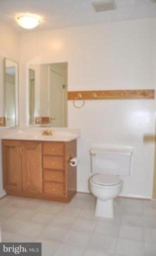 11510 Underoak Court Reston, VA 20191 - Photo 3 of 30 There's a large linen closet opposite this vanity.
