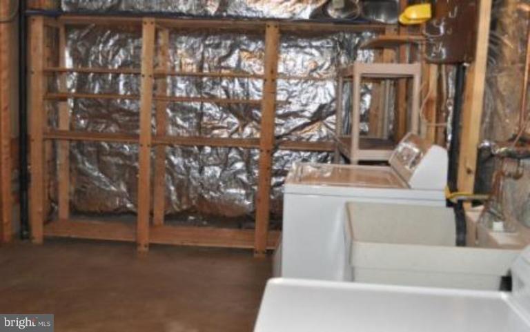 11510 Underoak Court Reston, VA 20191 - Photo 23 of 30 Look at all the built-in shelving for storage!