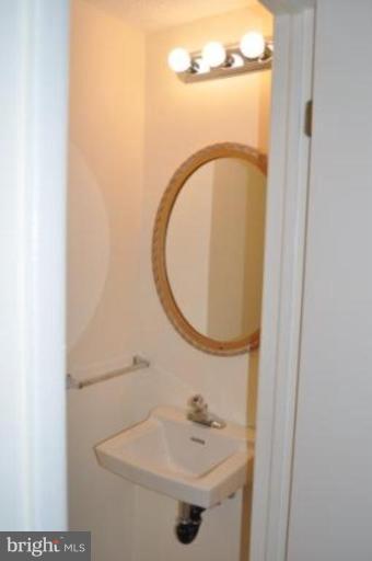 11510 Underoak Court Reston, VA 20191 - Photo 28 of 30 Powder room on lower level near family room.