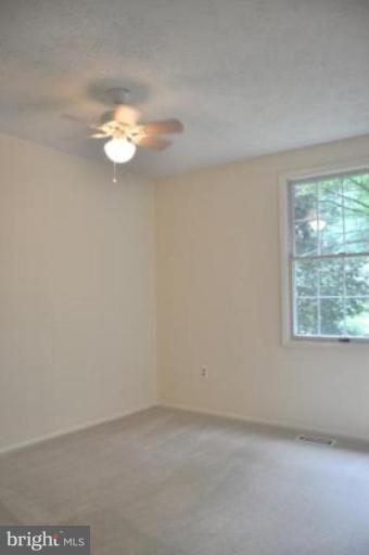 11510 Underoak Court Reston, VA 20191 - Photo 4 of 30 11 x 9 bedroom with ceiling faces courtyard.