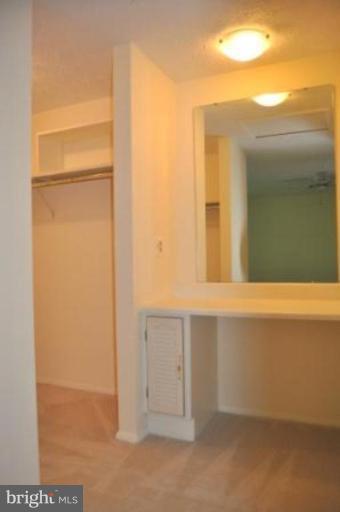 11510 Underoak Court Reston, VA 20191 - Photo 8 of 30 Master bedroom dressing vanity and walk-in closet.