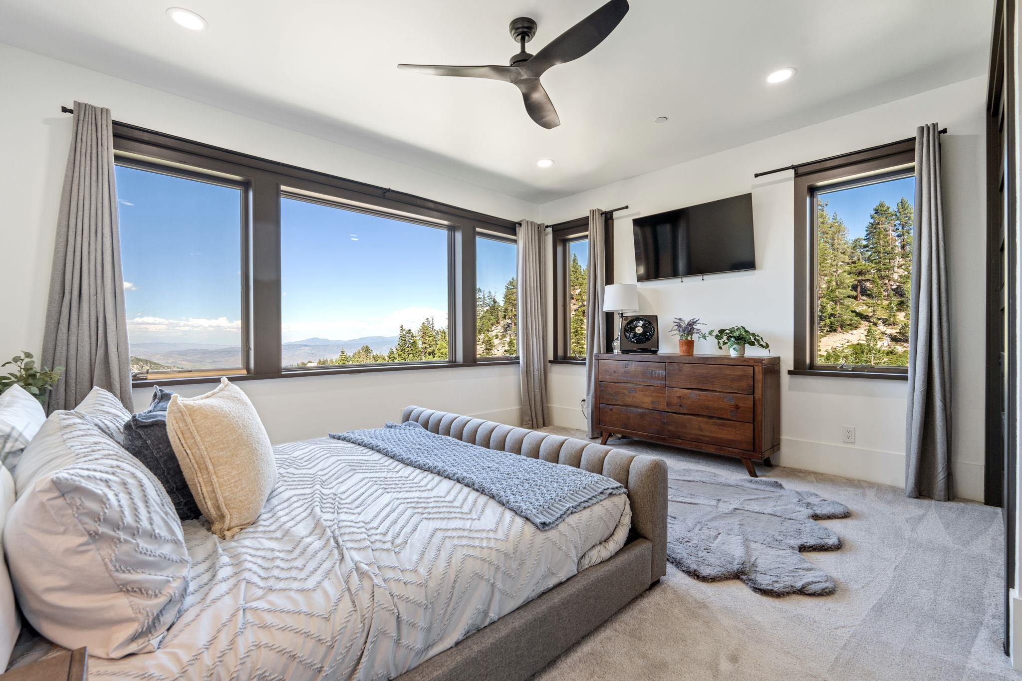 1625 Black Bear Trail Stateline, NV 89449 - Photo 12 of 20 a bedroom with a large bed and a window