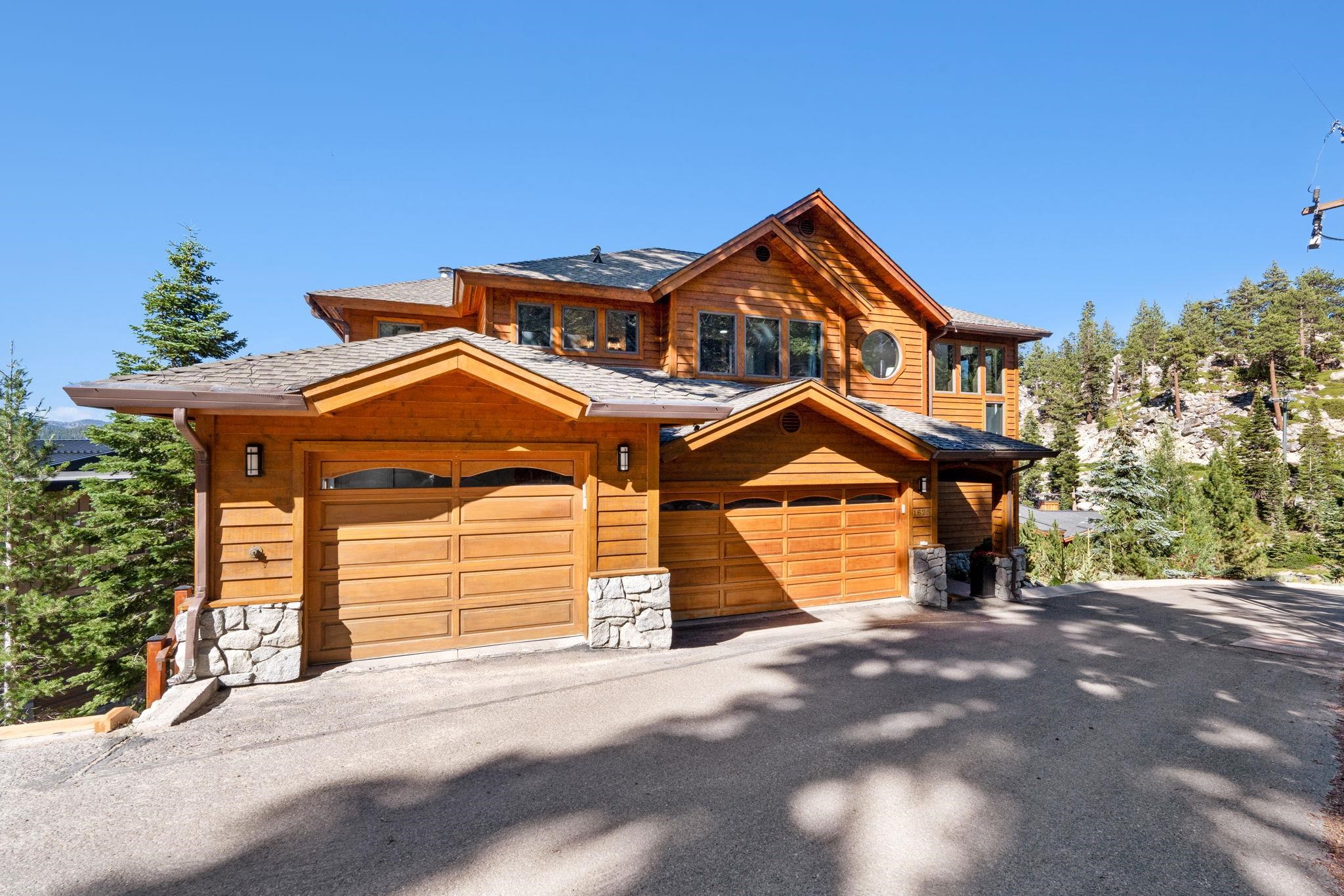 1625 Black Bear Trail Stateline, NV 89449 - Photo 20 of 20 a front view of a house with a yard and garage