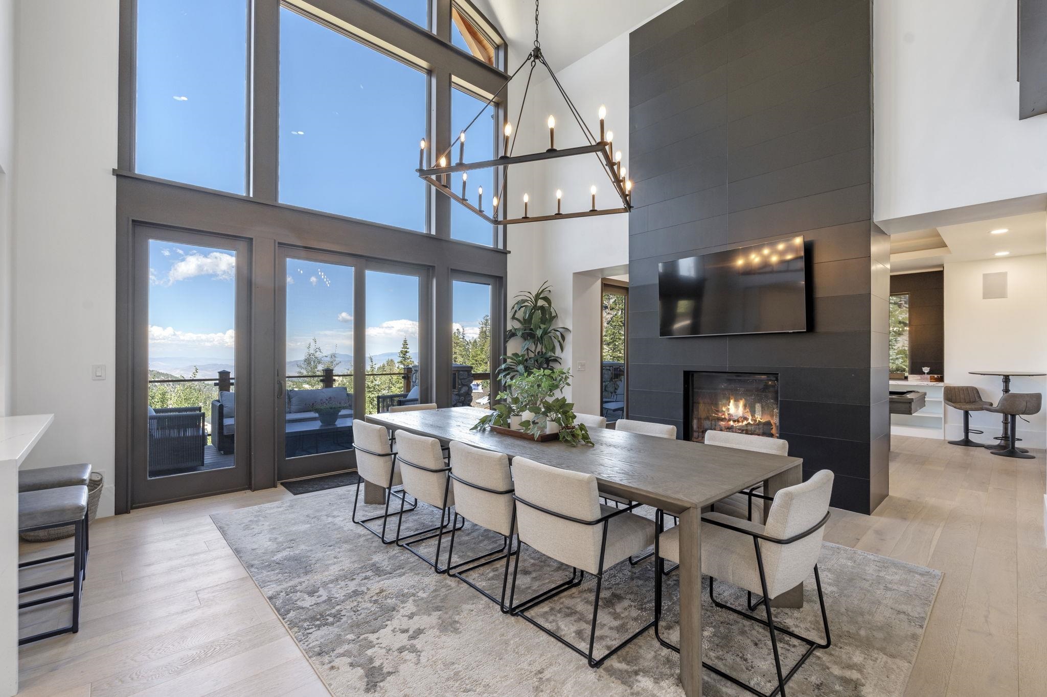 1625 Black Bear Trail Stateline, NV 89449 - Photo 3 of 20 a view of a dining room with furniture window and outside view