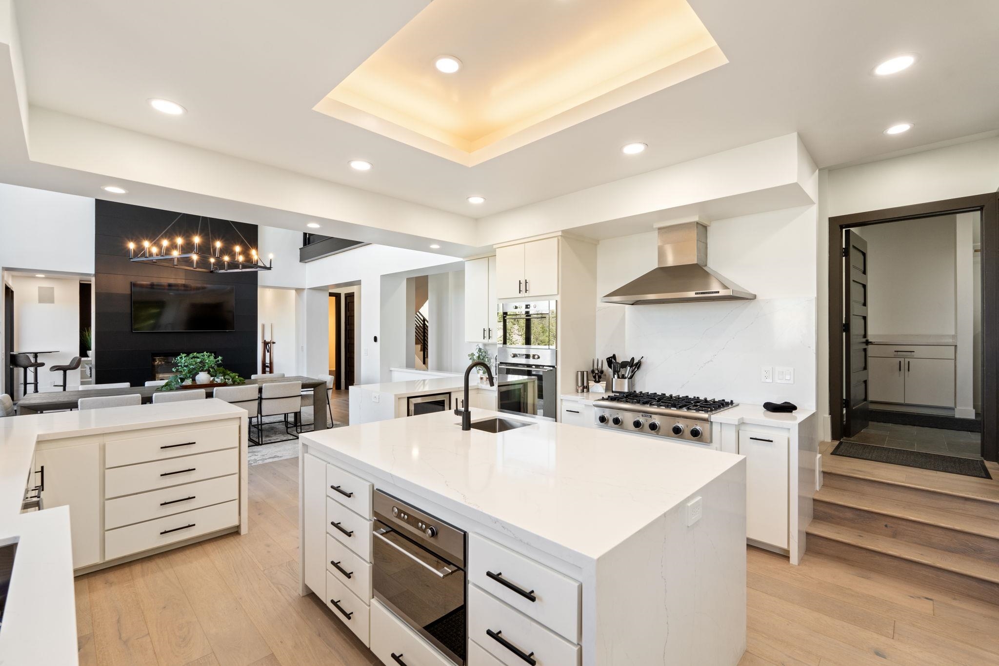 1625 Black Bear Trail Stateline, NV 89449 - Photo 6 of 20 a kitchen with stainless steel appliances a stove a sink and a refrigerator