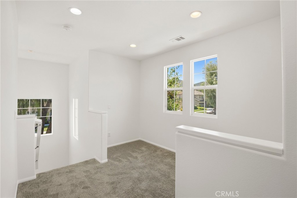 31598 Six Rivers Court Temecula, CA 92592 - Photo 22 of 43 an empty room with windows