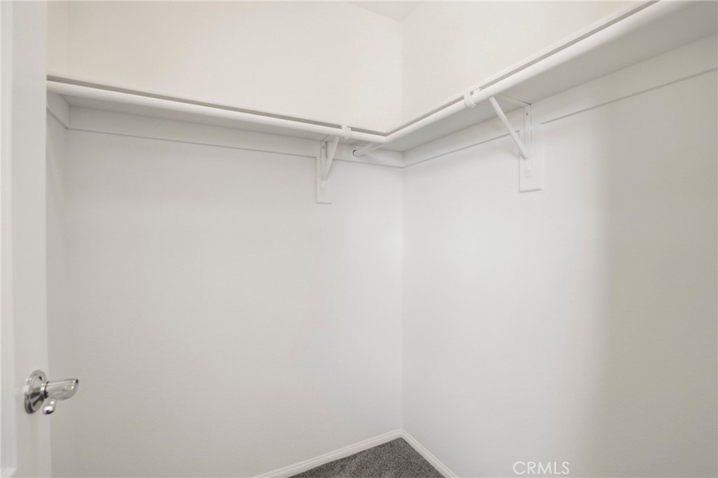 31598 Six Rivers Court Temecula, CA 92592 - Photo 33 of 43 a view of a room with shelf on the wall