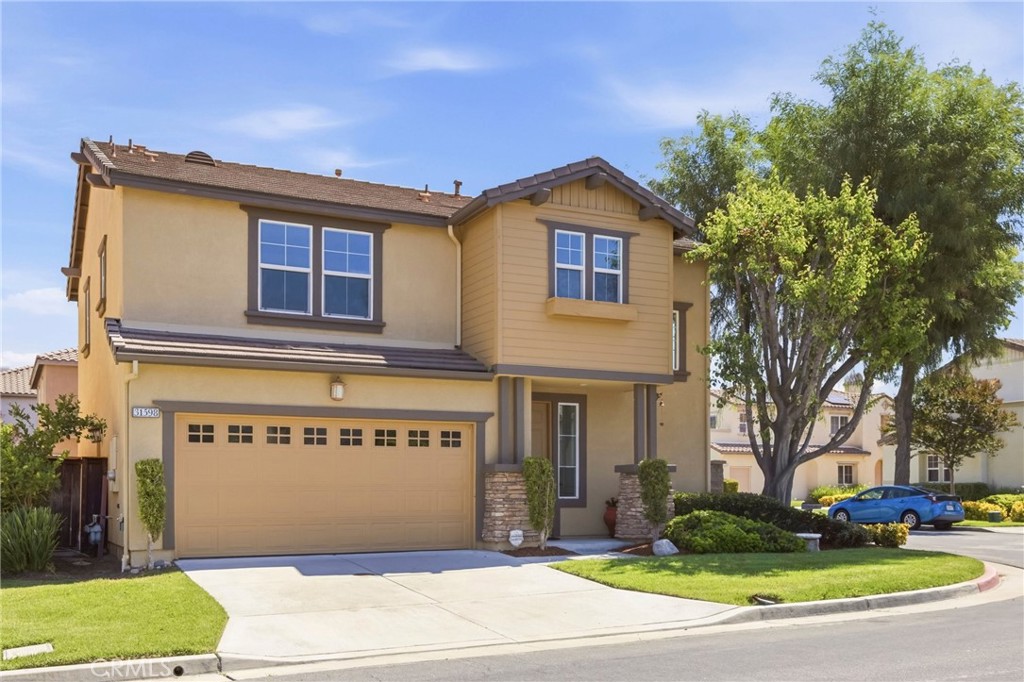 31598 Six Rivers Court Temecula, CA 92592 - Photo 9 of 43 a view of a house with a yard