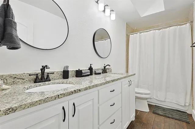 a room with a white wall and a window