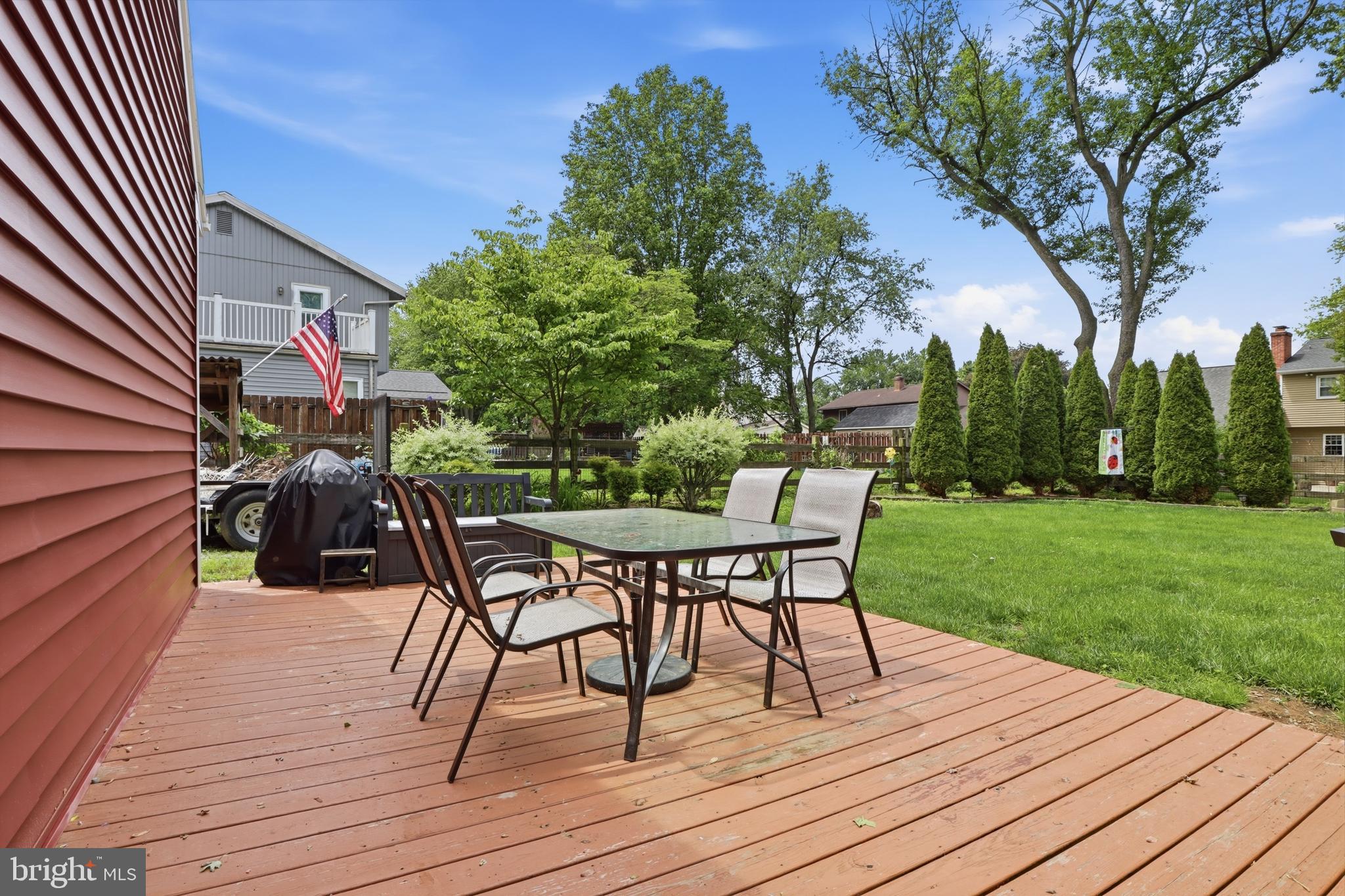 1072 Lambley Road Landisville, PA 17538 - Photo 12 of 46 a view of a dinning table and chairs on deck with wooden floor