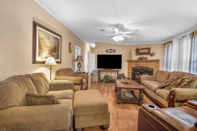 a view of a field with an trees