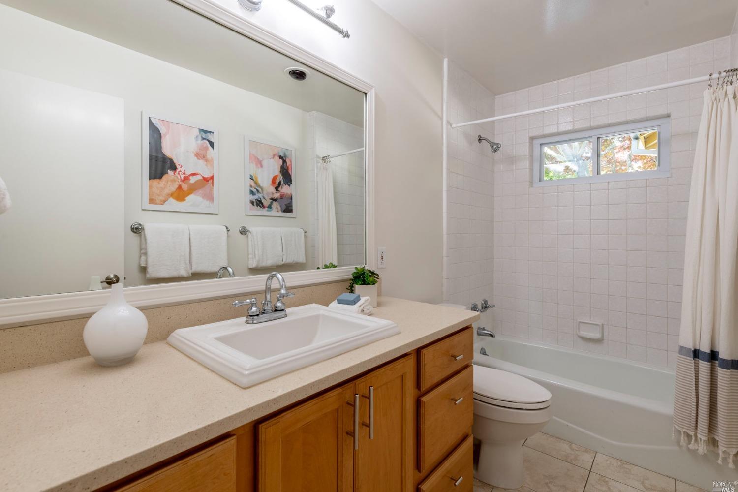 16 Loma Linda Road San Rafael, CA 94901 - Photo 23 of 46 a bathroom with a sink a toilet and shower
