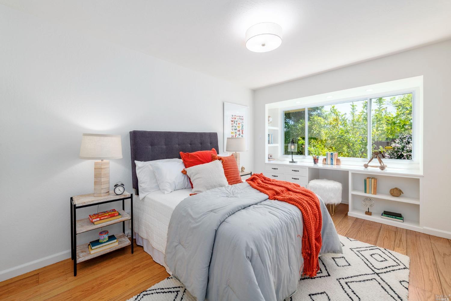 16 Loma Linda Road San Rafael, CA 94901 - Photo 26 of 46 a bed room with a bed and a large window