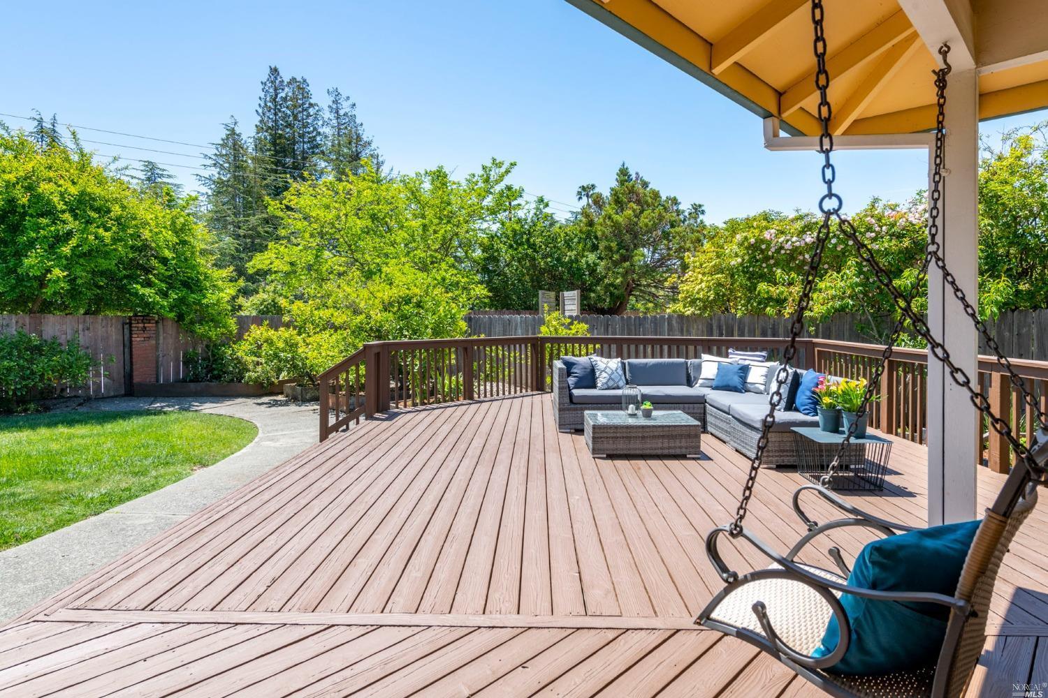 16 Loma Linda Road San Rafael, CA 94901 - Photo 37 of 46 a view of a patio with couches table and chairs and potted plants