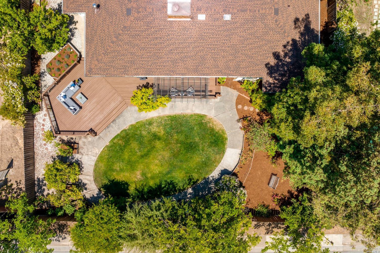 16 Loma Linda Road San Rafael, CA 94901 - Photo 44 of 46 a aerial view of a house with a yard and garden