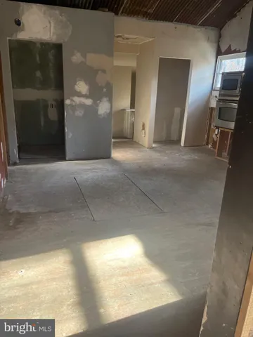 a view of a hallway with entryway