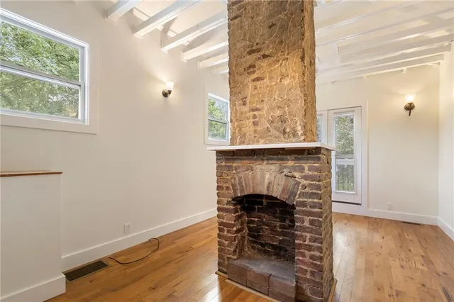 a swimming pool with outdoor seating and yard