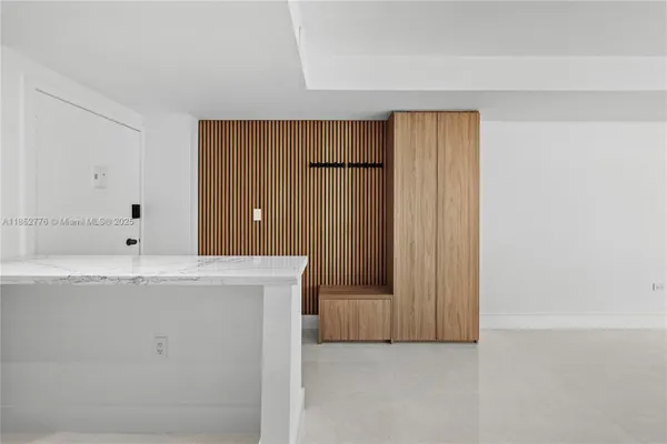 a view of a kitchen with a sink