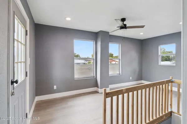 a view of an empty room with a window