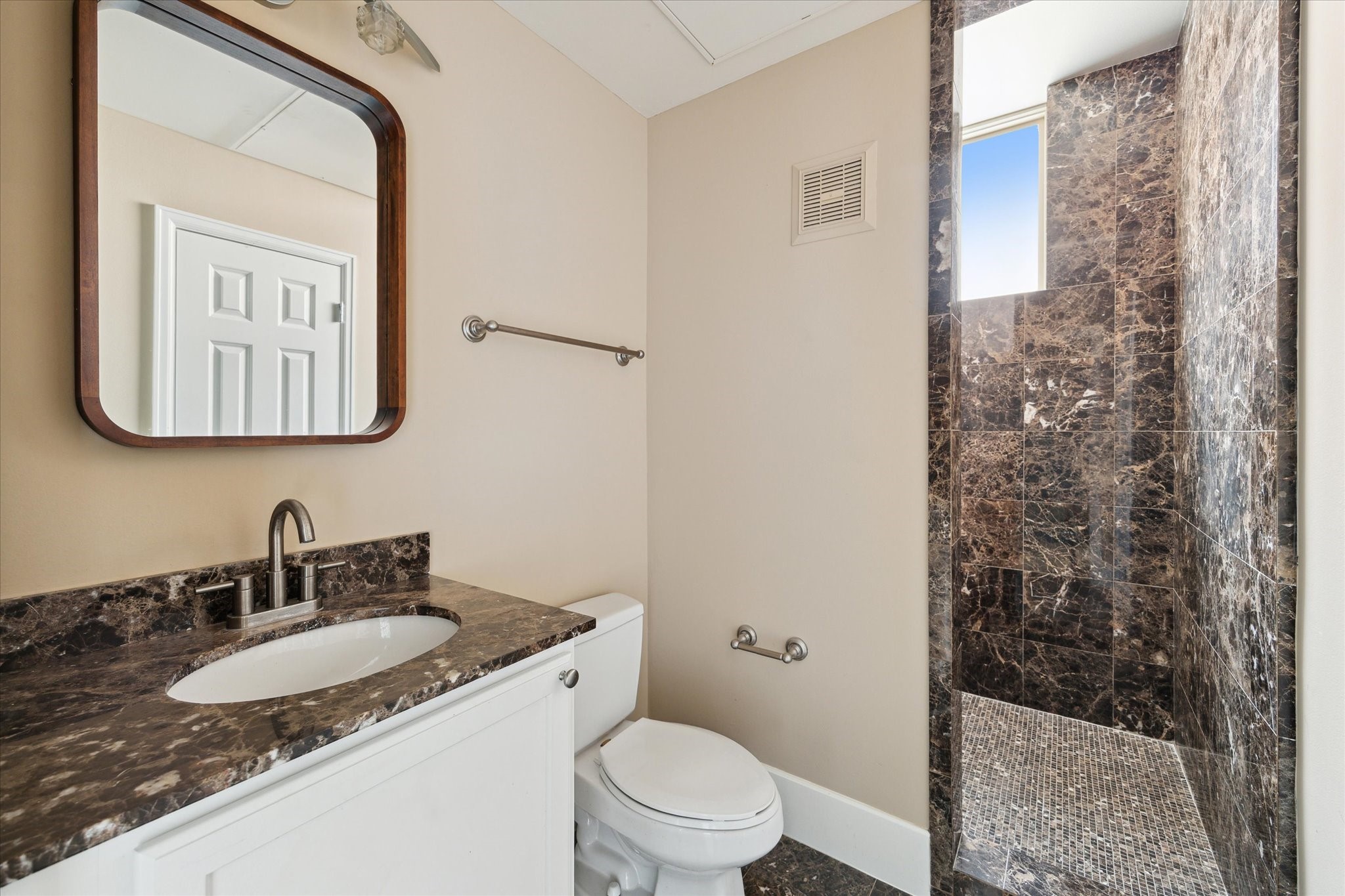 2520 Robinhood Street, Unit 1200 Houston, TX 77005 - Photo 23 of 29 a bathroom with a granite countertop sink toilet and shower