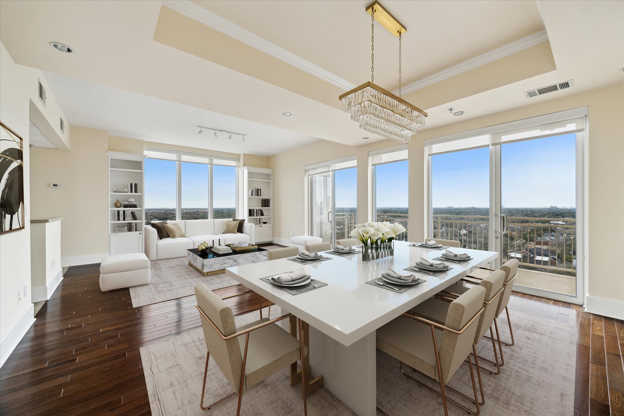 2520 Robinhood Street, Unit 1200 Houston, TX 77005 - Photo 4 of 29 a dining room with wooden floor a chandelier fan a wooden table and chairs