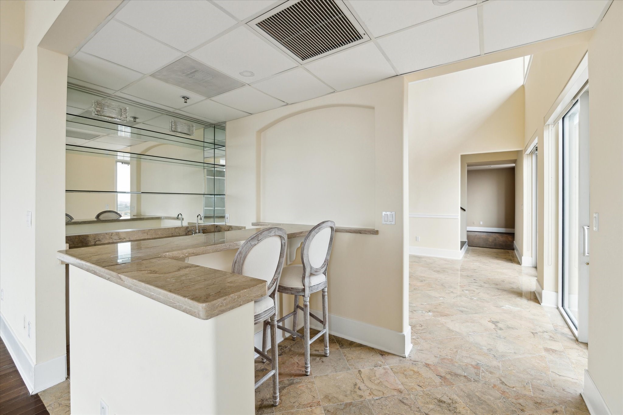 2520 Robinhood Street, Unit 1200 Houston, TX 77005 - Photo 7 of 29 a kitchen with a table and chairs