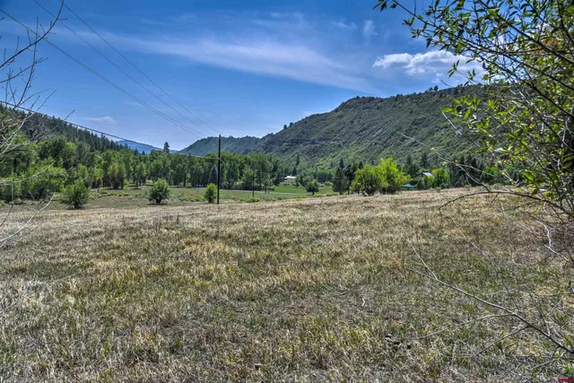 a view of mountain with sunset view