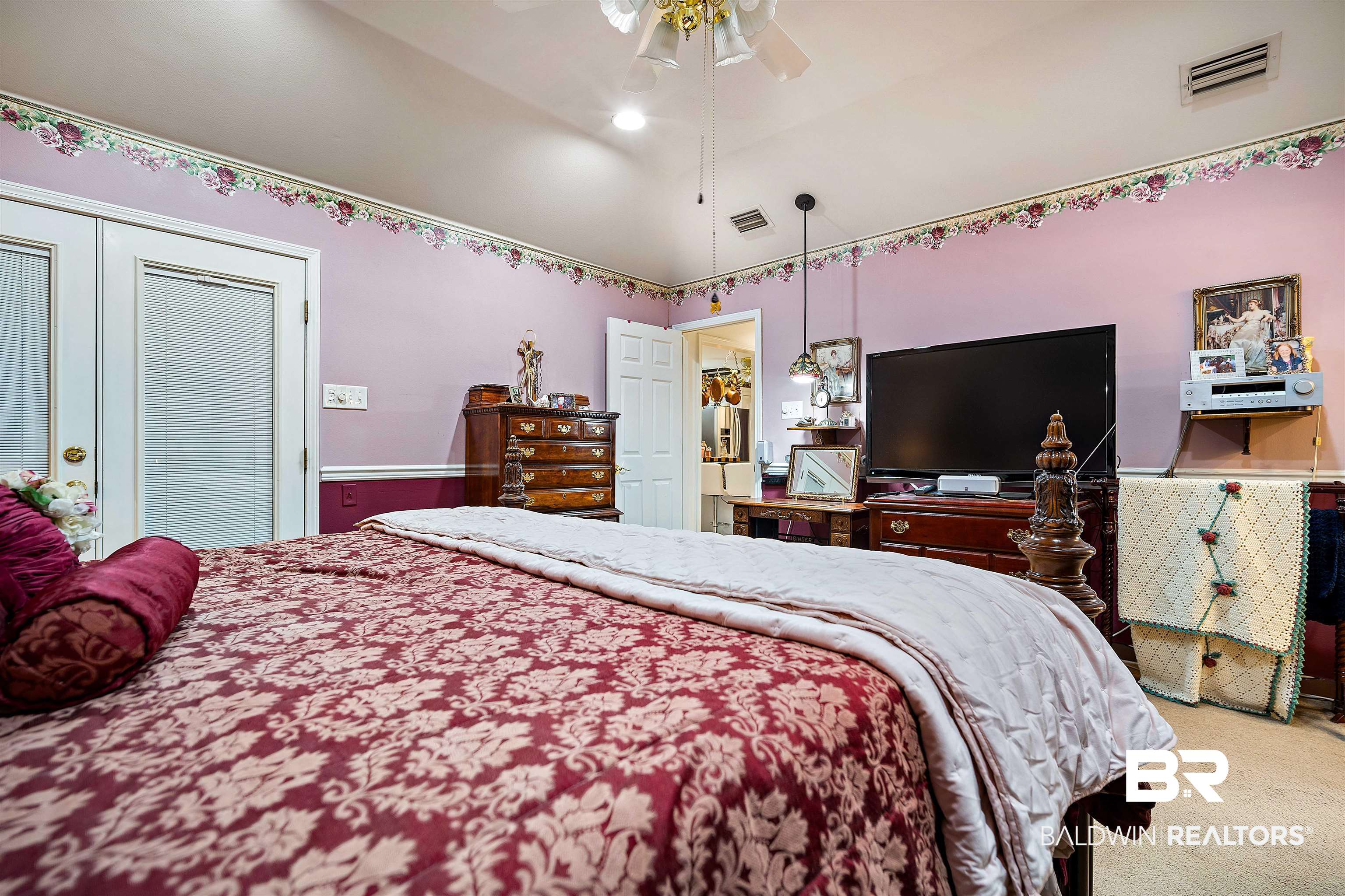 1744 Aden Road Mobile, AL 36695 - Photo 17 of 35 Carpeted bedroom featuring ceiling fan and vaulted ceiling